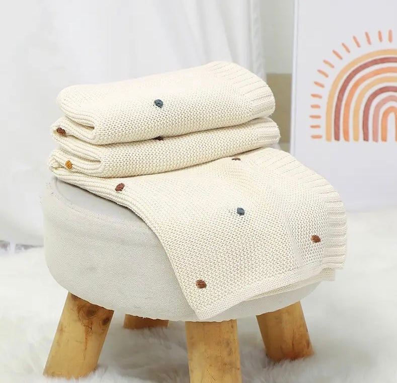 Cream blanket with coloured bobbles