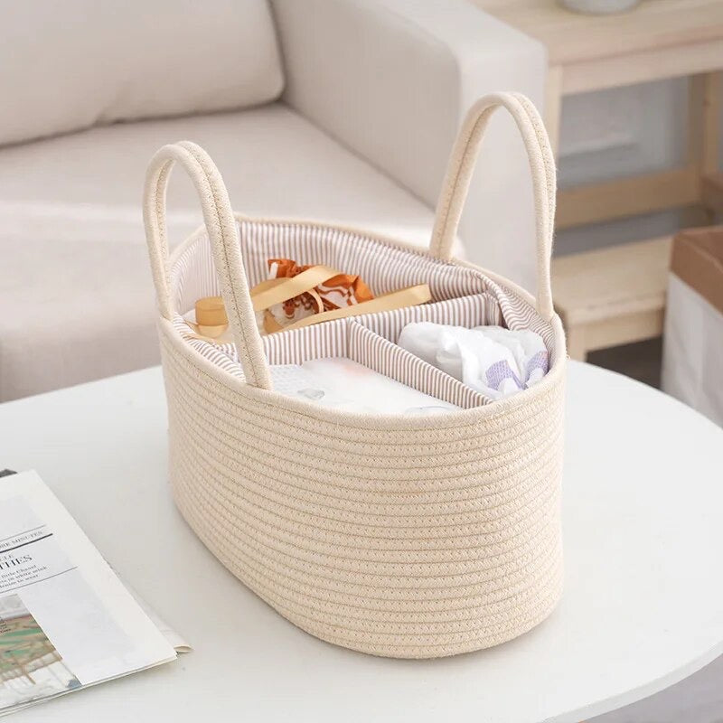 Lifestyle image of cream nappy caddy for baby